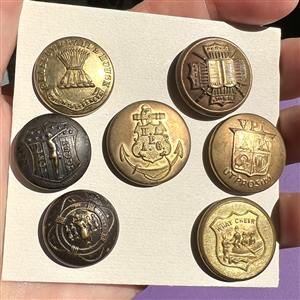 Twenty two U.S. and foreign assorted uniform buttons. 