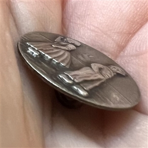 Highly Collectible 3rd Avenue silver button “Dutch Boy and Girl.”