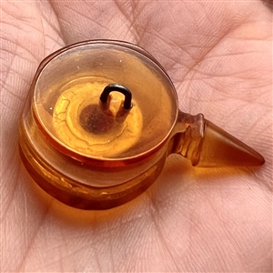 Bakelite realistic perfume bottle button.