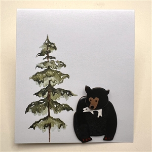 Janet White’s “Black Bear with Supper” enamel on copper studio button.