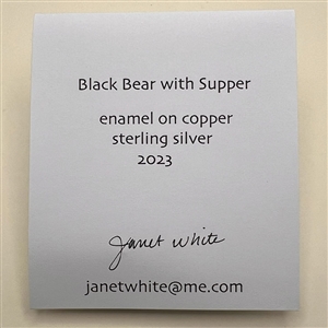 Janet White’s “Black Bear with Supper” enamel on copper studio button.