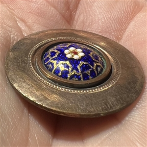 An 18th c. enamel set in copper button.