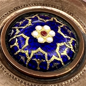 An 18th c. enamel set in copper button.