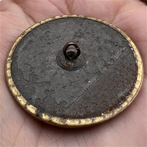 An 18th c. button of tinted steel with pearl, tinted steel flower and paste center.