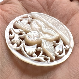Bethlehem pearl #91 “Sleeping Angel” button.