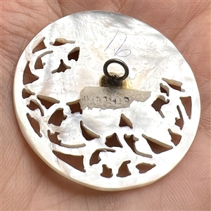 Bethlehem pearl #91 “Sleeping Angel” button.