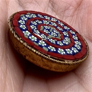 Italian mosaic target of flowers button.