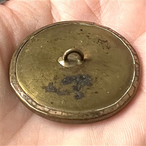 An 18th c. painting on natural material under glass set in metal button of warrior.