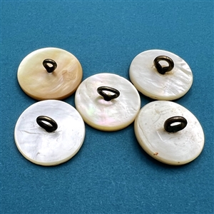 Five thick Colonial pearl buttons.