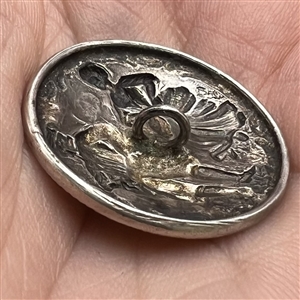 Hallmarked silver button of a couple dancing.