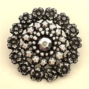 Silver button imitating “Court Steel.”