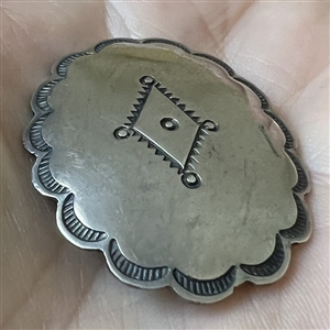 Two Native American buttons, beaded and silver.