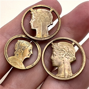 Three unique “coin type” buttons made from French coins.