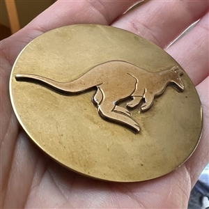 Huge brass on brass button of a kangaroo by Phil Linley.