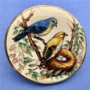 Huge ceramic button of birds by Shirley.