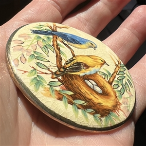 Huge ceramic button of birds by Shirley.