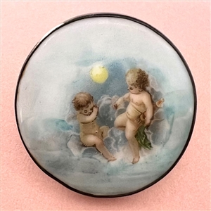 Extra large porcelain button of cherubs.