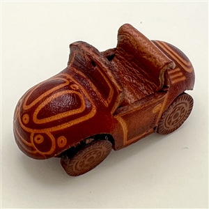 Leather realistic car button.