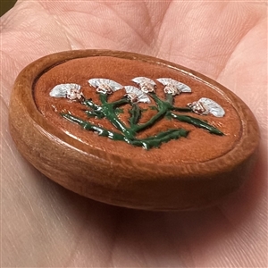 Nancy DuBois studio button of thistles.