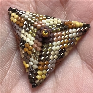Unique beaded studio button by Lili Cantelmi.