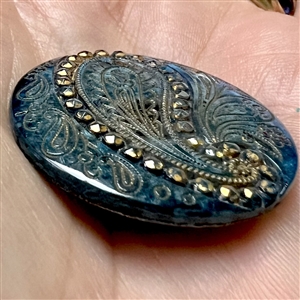 Beautiful Lacy glass paisley button.