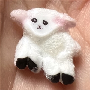 Mary Gaumond’s little lamb studio glass button.