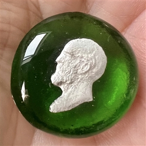 Theresa Rarig studio glass sulphide of man’s head paperweight button.