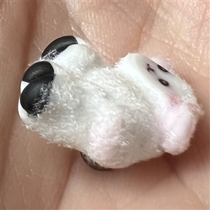 Mary Gaumond’s little lamb studio glass button.