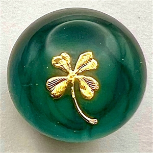 Glass paperweight studio button with clover by John Gooderham.