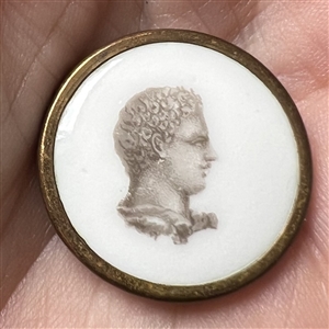 Liverpool transfer of man’s head on ceramic button.