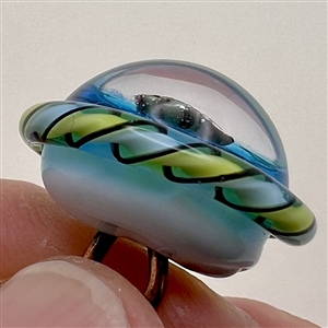 Studio glass button of a turtle by Mavis Smith.