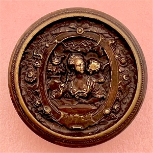 Stamped brass button of woman interacting with a cherub.