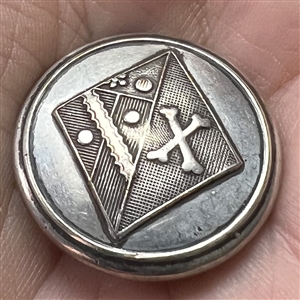 Livery woman’s lozenge button.