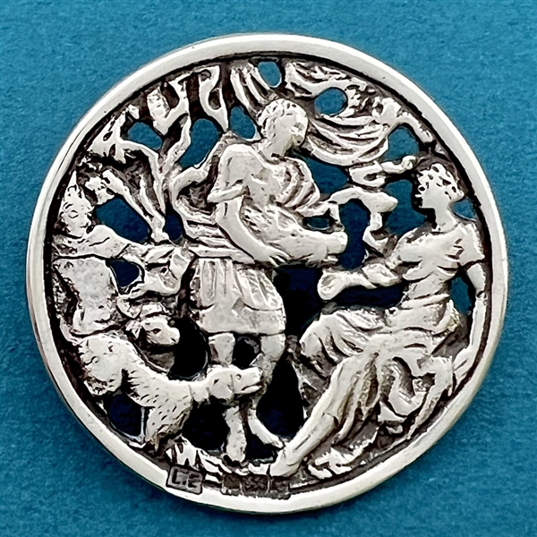 Hallmarked silver button of people with dogs.
