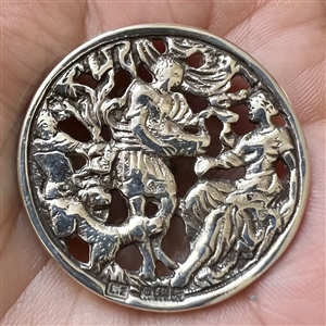 Hallmarked silver button of people with dogs.