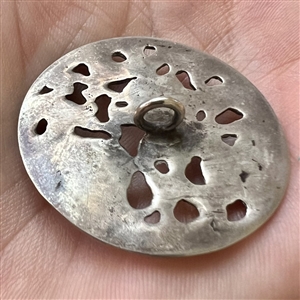 Hallmarked silver button of people with dogs.