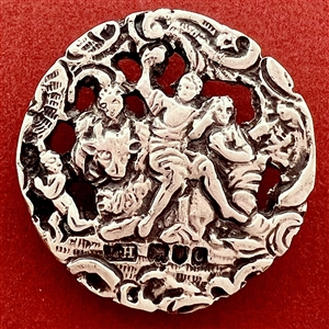 Hallmarked silver button of three women with a cherub.