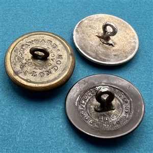 Three livery crest buttons of dogs.