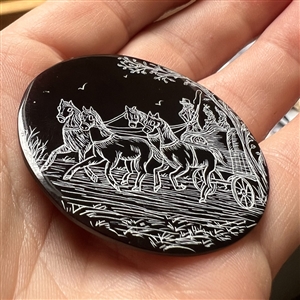 Large Nancy DuBois pina shell button of a horse drawn carriage.