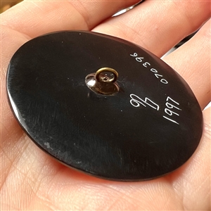 Large Nancy DuBois pina shell button of a horse drawn carriage.