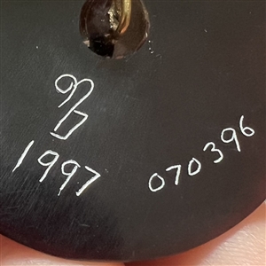 Large Nancy DuBois pina shell button of a horse drawn carriage.