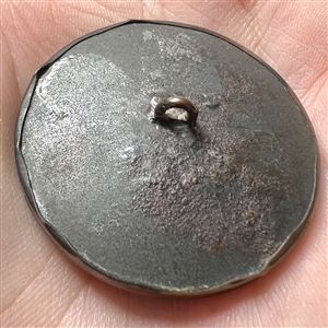 An 18th c. “en grisaille” painting  on natural material button of an angel writing a list.