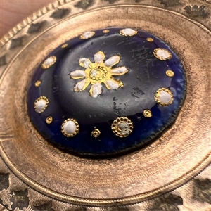An 18th c. Copper button with enameled plaque center.