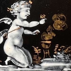 “En grisaille” enamel button of cupid blessing a couple.