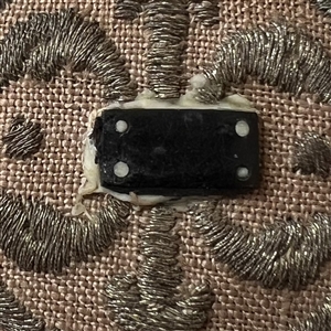 An 18th c. Transitional passementerie fabric button.