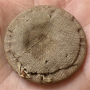 An 18th c. Transitional passementerie fabric button.