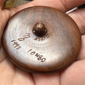 Extra large Nancy DuBois leather studio button of bearded iris.
