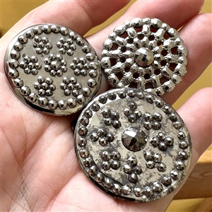 Three steel buttons, two are 18th c.