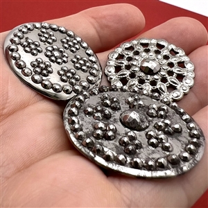 Three steel buttons, two are 18th c.