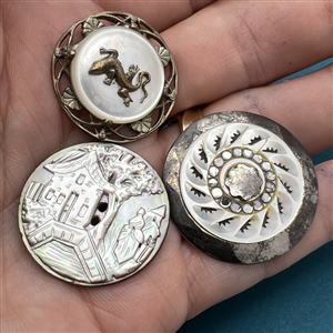Three interesting shell buttons.